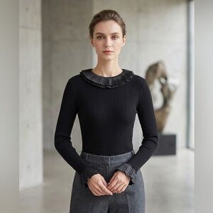 Oscar de la renta wool knit with ruffle details
